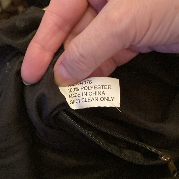 This is a beautiful purse with a southwestern pattern. Small flaps on - Picture 2 of 3